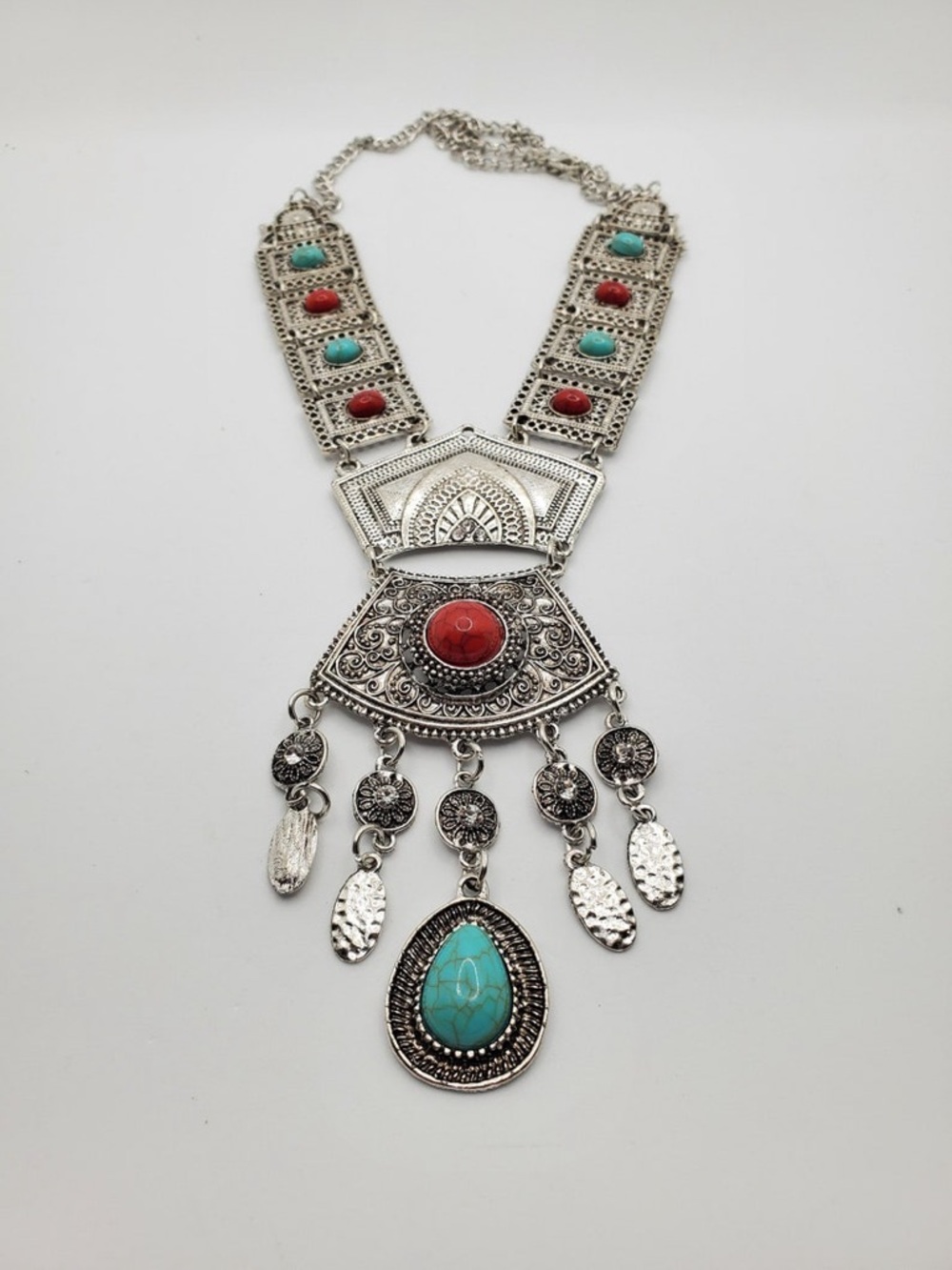Silver-Tone Statement Pendant Necklace with Red and Turquoise Accents
